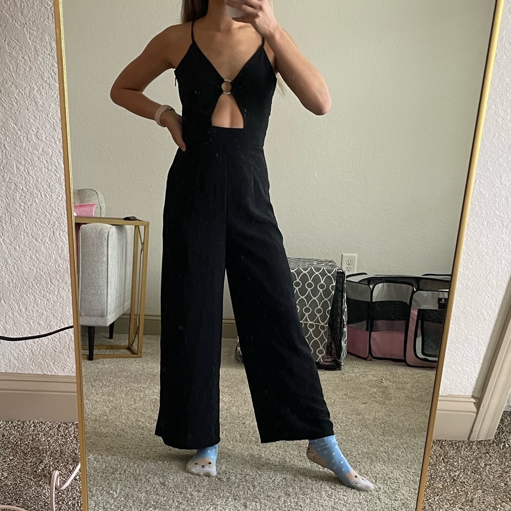 Size 0 H&M black jumpsuit with cut out